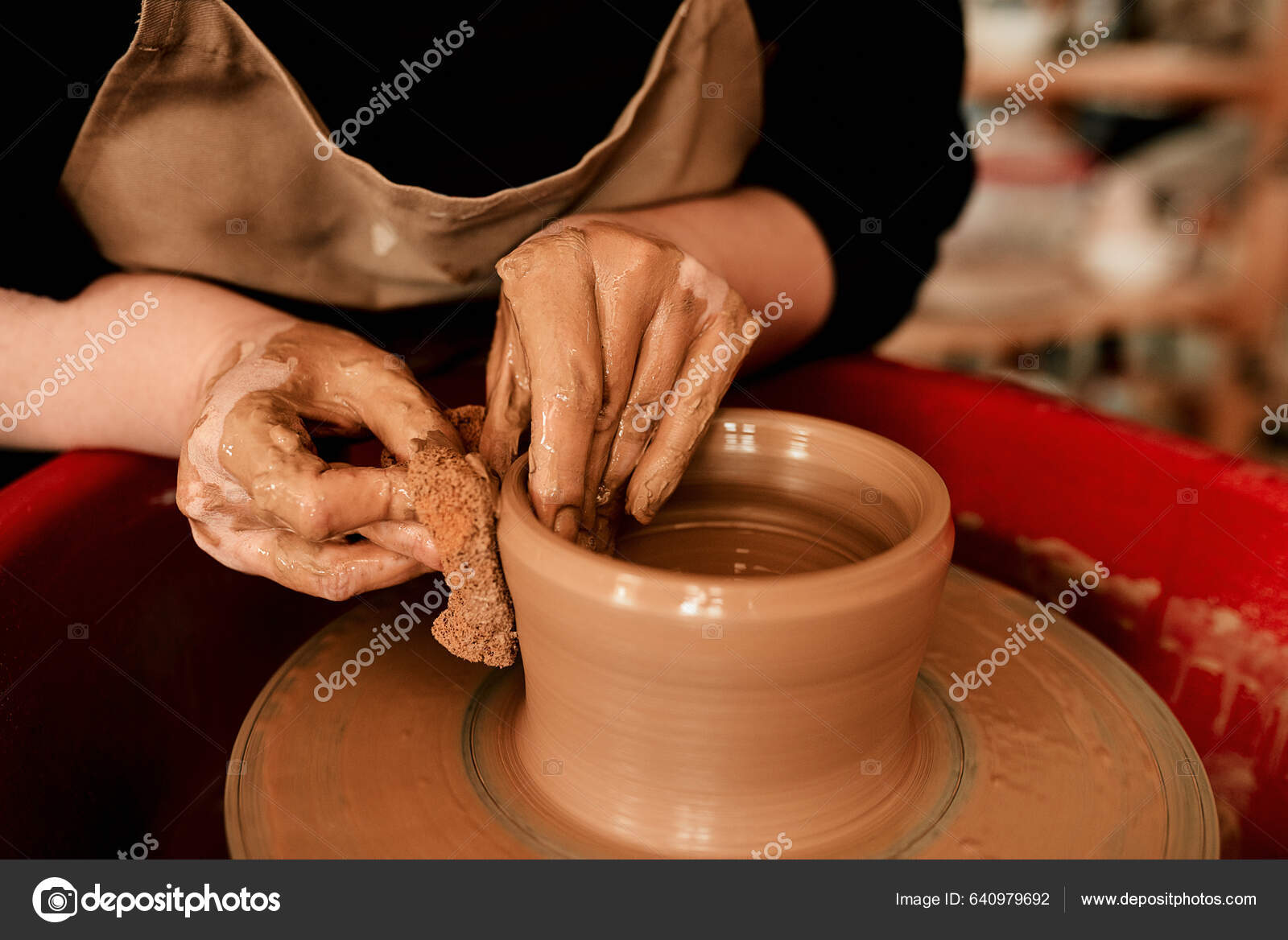 Creative, pottery and design with hands of woman in workshop
