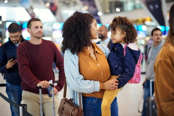 Airport, happy mother and girl at international flight check for plane board or airplane ticket payment. Happy mom, child and family waiting at gate for air travel and security before transport.