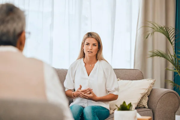 Woman, communication and psychology consulting for therapy, mental healthcare or support. Patient talking to psychologist, therapist and counseling help for medical depression, life stress or anxiety.