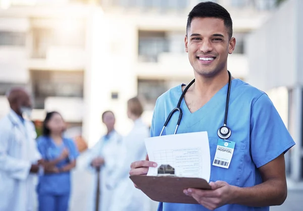 Checklist, portrait and happy doctor or man with hospital leadership, workflow management and surgeon schedule. Face of healthcare worker, nurse or young person with medical services and paperwork.
