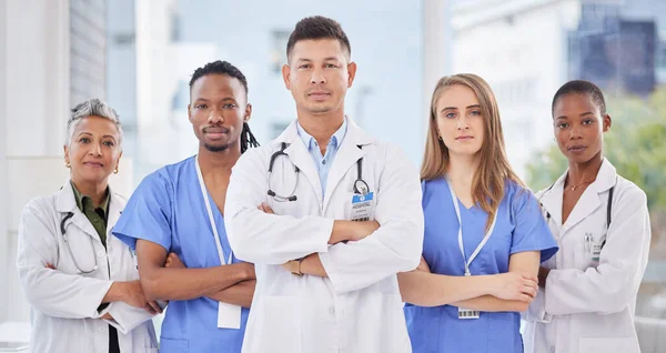 Arms crossed, medicine teamwork and diversity portrait for medical collaboration, support or wellness surgery. Group of healthcare doctors, nurses and focus with motivation, trust or hospital mission.