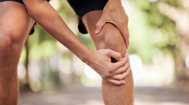 Knee pain, hands and legs injury at park after training, workout or exercise accident. Sports, fitness and man or runner with fibromyalgia, inflammation or arthritis after .exercising, running or jog. clipart