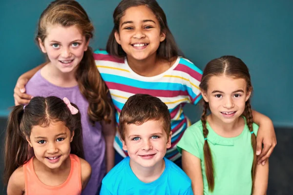 Friendship Matters Studio Portrait Diverse Group Kids Posing Together Blue —  Fotos de Stock