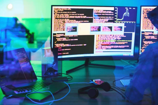 Developer, code or computer screen in neon programming, cybersecurity ransomware or SEO night phishing in basement. Hacker, programmer or woman on technology coding for dark software, iot bug or scam.