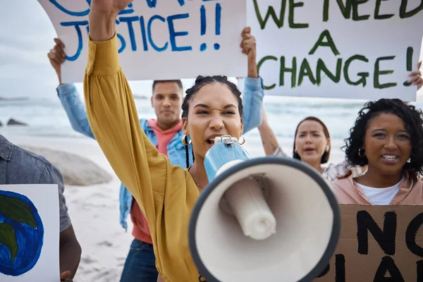 Protest, climate change and black woman with megaphone, fight for freedom with voice, movement and environment rights. Politics, angry people on beach for activism and solidarity with saving planet.