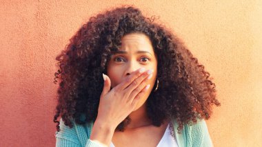 Black woman, surprise face and smartphone with shocked reaction to online news, meme or social media. Technology, communication and announcement with wow expression isolated on color background. clipart