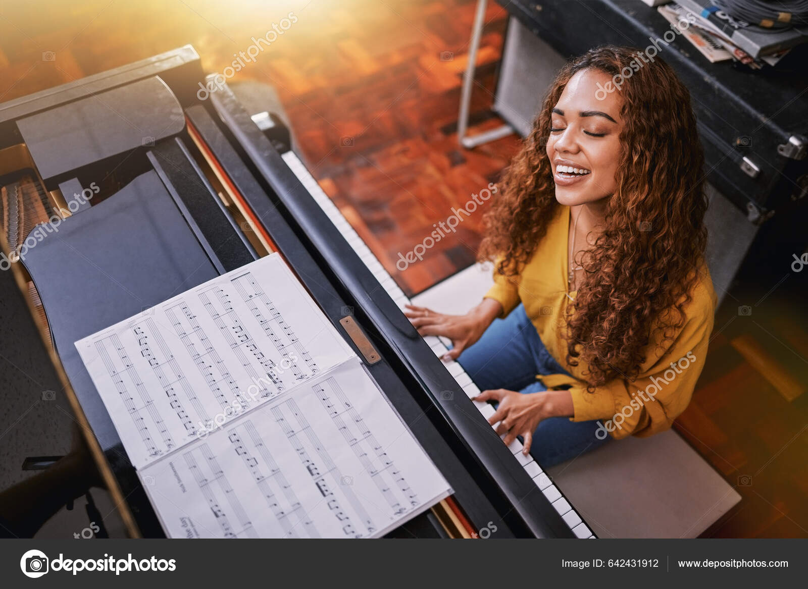 Woman Singing Playing Piano Music Notes Smile Home Musician Talent Stock  Photo by ©PeopleImages.com 642431912