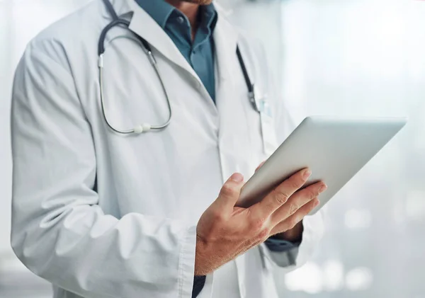 Healthcare, research and hands of doctor with tablet for wellness, medical abstract and analysis. Hospital, insurance and health worker on digital tech for internet, patient report and telehealth app.