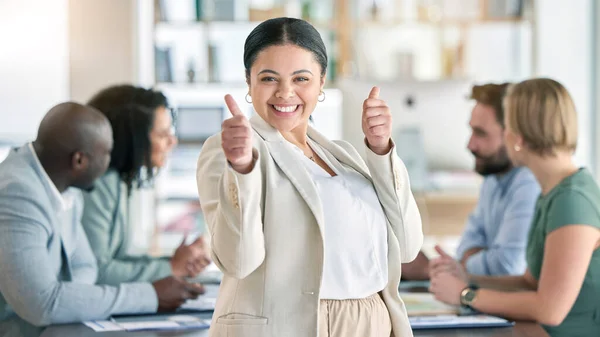 Thumbs up, corporate employee and portrait of a happy worker in a business meeting. Office, success and achievement hand gesture of a lawyer feeling happiness from law firm growth and collaboration.