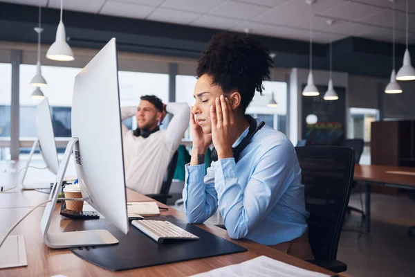 Burnout, call center and black woman with headache in office while consulting in crm or customer service. Stress, glitch or 404 by girl consultation with problem, frustrated or fail in online support.