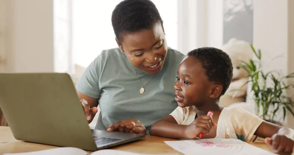 Teaching, learning and black family and child in home with laptop and color book happy with online education, kids website and online digital guide. Happy african mother with girl writing development.