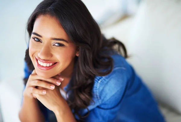 stock image Shes got a beautiful smile. a young woman relaxing at home on the weekend