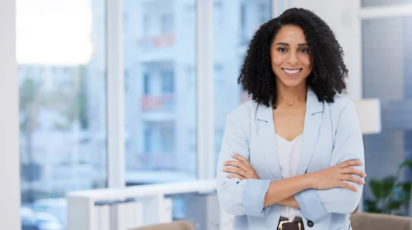 Business woman, leadership and portrait smile with arms crossed in corporate management at the office. Happy confident African American female leader, manager or CEO smiling for career success.