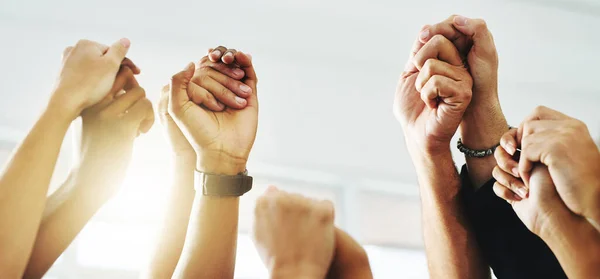 Closeup Shot Group Unrecognizable Businesspeople Holding Hands While Raising Arms — Stock Photo, Image