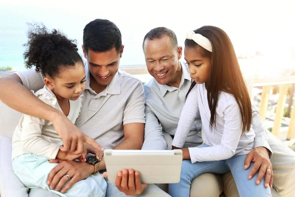 Tablet, black family and kids with online video, movies or cartoon together for love, learning and bonding. Happy fathers day, relax and children watch film or show on digital technology for holiday.