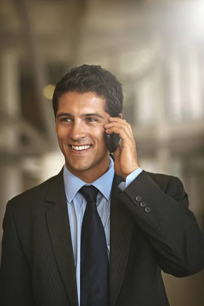 stock image Its good to hear from you. a businessman in his office