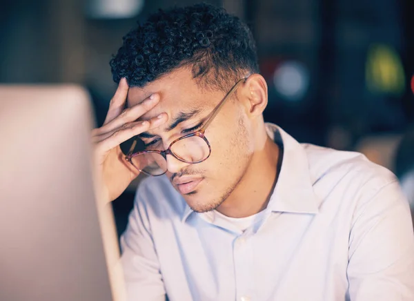 Stock image Tired business man, headache and night stress, depressed or burnout, thinking and working on office computer. Focus problem, exhausted and mental health of corporate person or professional on desktop.