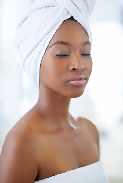 Put the health of your skin first. a beautiful young woman during her daily beauty routine