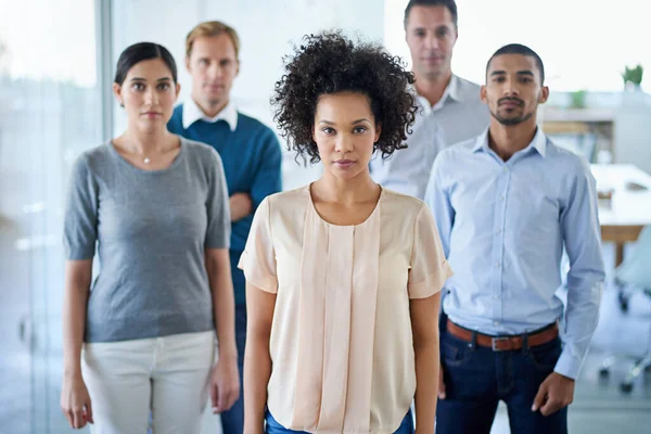 stock image Success starts now. Portrait of a group of diverse colleagues standing in an office