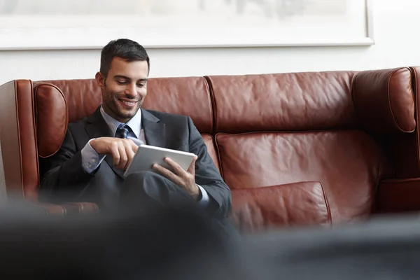Surveying His Companys Latest Figures Smiling Young Businessman Sitting Leather — Stock Photo, Image