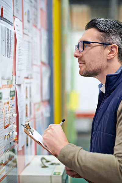 stock image Organized in every detail. a man working in a large warehouse