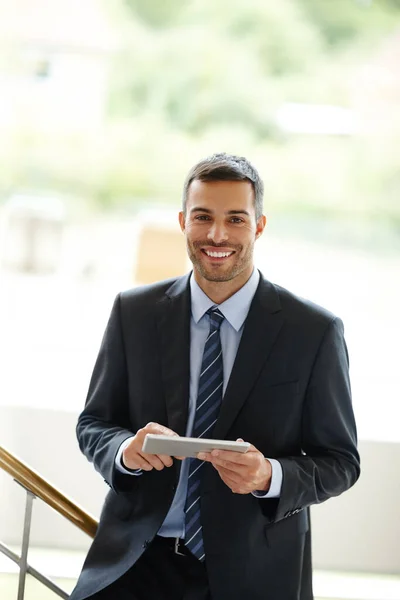 Its Great Corporate Tool Handsome Young Businessman Using Digital Tablet Stock Picture