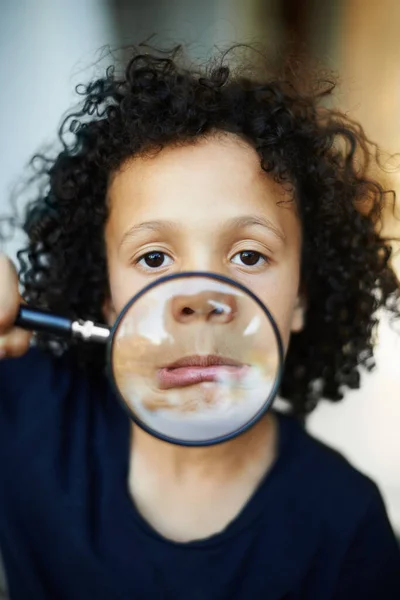 Clowning Little Boy Holding Magnifying Glass His Mouth Pulling Faces — Stock Photo, Image