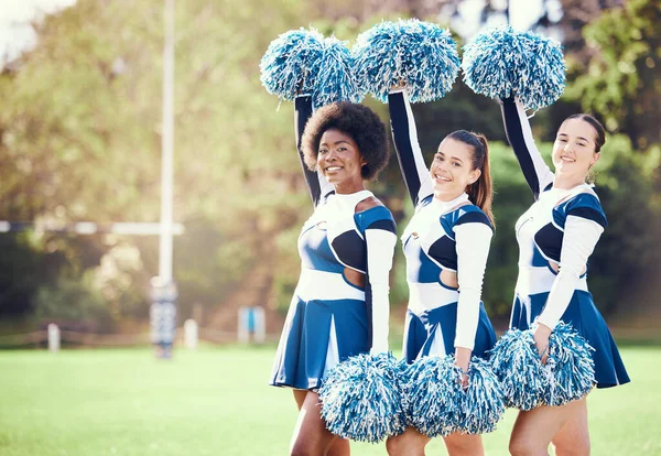 Portrait, cheerleading and mockup with sports women on a field for motivation during a competitive game. Teamwork, support and diversity with a woman cheerleader group on a pitch for a sport event.