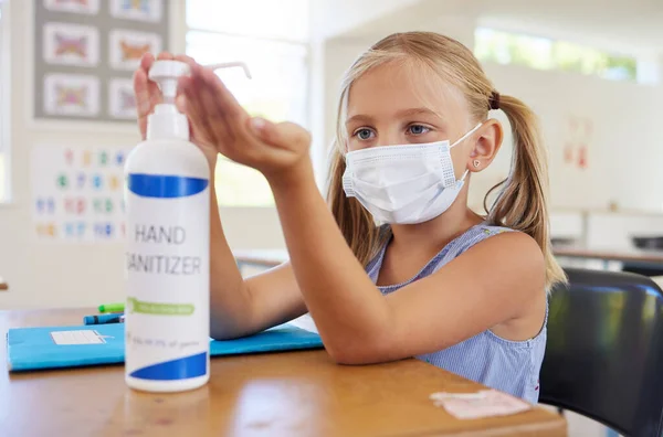 Little Student Sanitizing Hand Protect Covid Wearing Mask New Hygiene — Stock Photo, Image