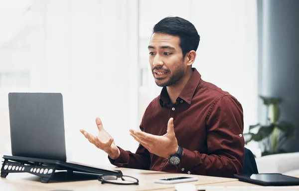 stock image Video call, laptop and business man in office talking, chatting or speaking. Webinar, online meeting and serious male professional with computer for virtual conference, discussion and conversation