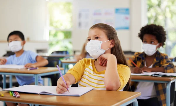 Focused Young Girl School Covid Pandemic Sitting Listening Classroom While — Stock Photo, Image