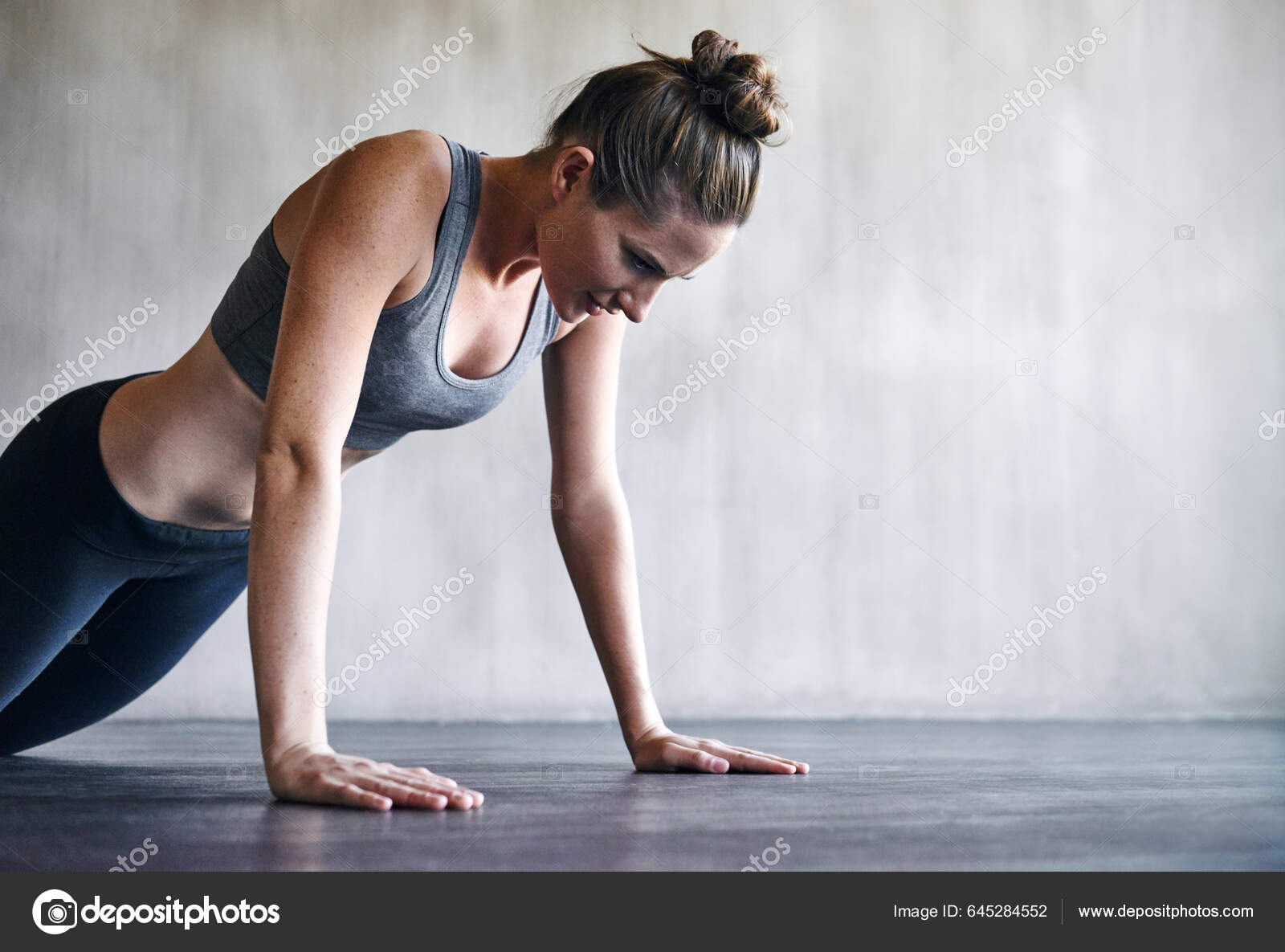Its Tough Its Worth Woman Doing Push Ups Gym Stock Photo PeopleImages 645284552