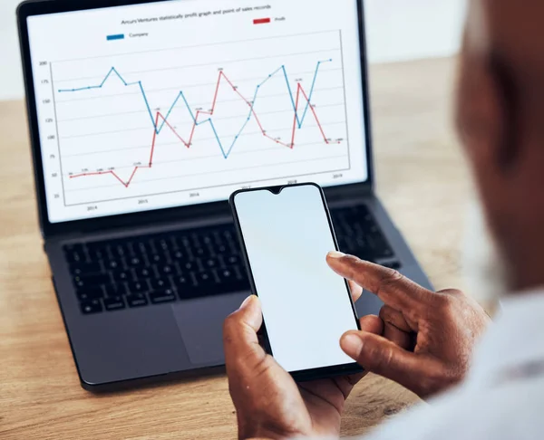 stock image Chart, laptop screen and phone, mockup and data analysis, black man and hands with sales information. Analyst, finance and financial growth monitor, ux and app with technology, dashboard and stats.