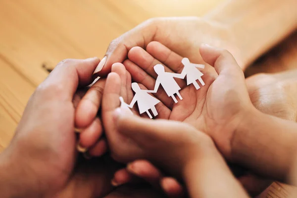 Hands, family and paper cutout, support and connection, link and bonding, foster care and adoption. Palm, parents and child with parenthood, art and craft with solidarity and community with trust.