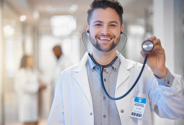 Stethoscope, portrait or happy man doctor with leadership in hospital or clinic with smile or pride. Healthcare manager with job mindset for medical solutions or problem solving in health service.