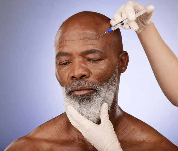 Face, senior black man and botox injection in studio isolated on a purple background. Retirement, plastic surgery or elderly male model with cosmetics, prp or filler for skincare, beauty and wellness.