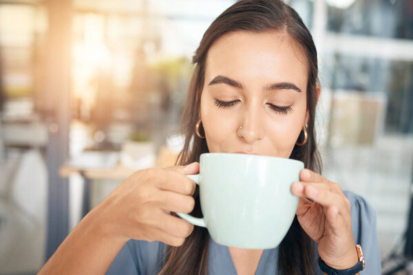 Coffee drink, cup and face of woman drinking hot chocolate, tea or morning beverage for hydration, wellness or to relax. Caffeine, female business manager or corporate office person with espresso mug.