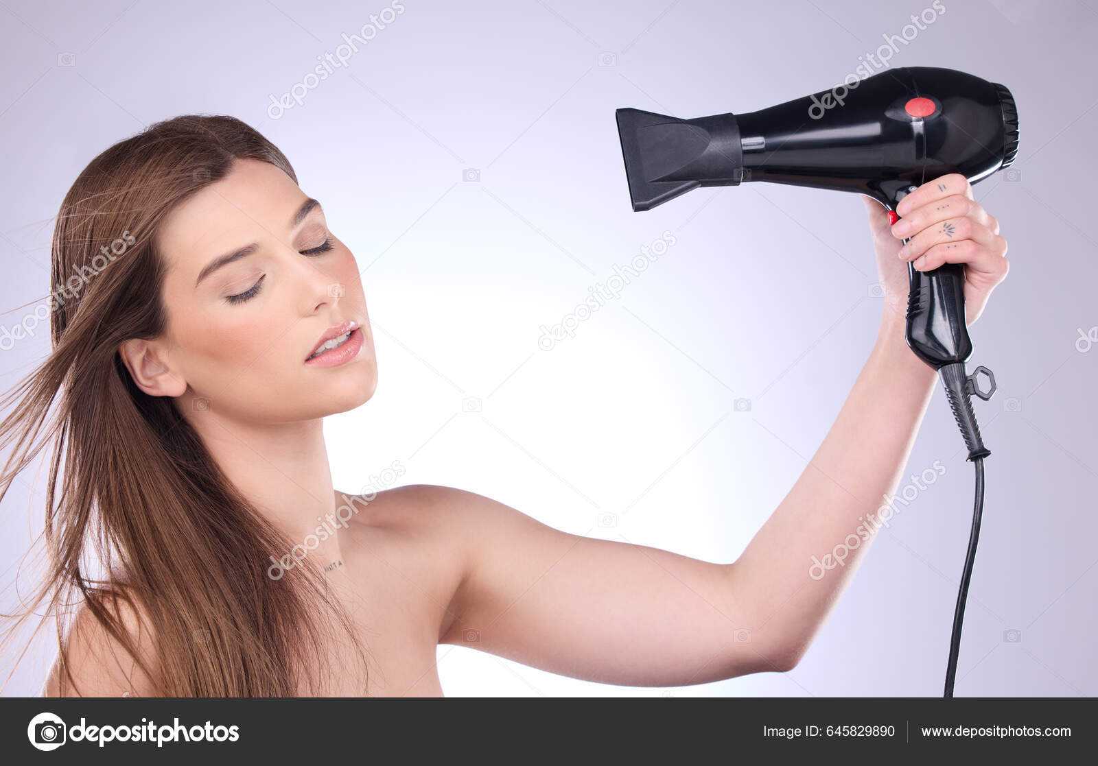 Beauty Hair Dryer Woman Blowing Her Hairstyle Studio Gray Background Stock  Photo by ©PeopleImages.com 645829890