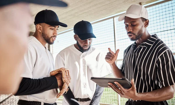 Sports group, planning or baseball coach with strategy ideas in training or softball game in dugout. Leadership, formation on tablet or black man with athletes for fitness, teamwork or mission goals.