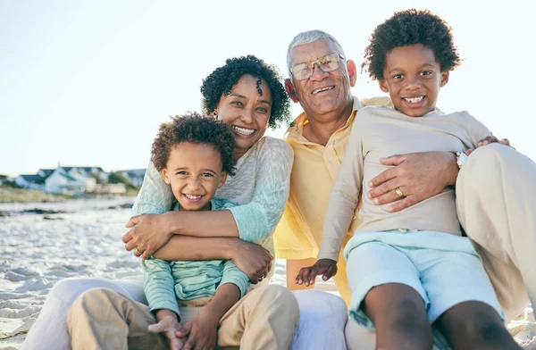 Smile, grandparents and portrait of children at beach enjoy holiday, summer vacation and weekend. Family, love and happy grandpa, grandmother and kids hug for quality time, relax and bonding.