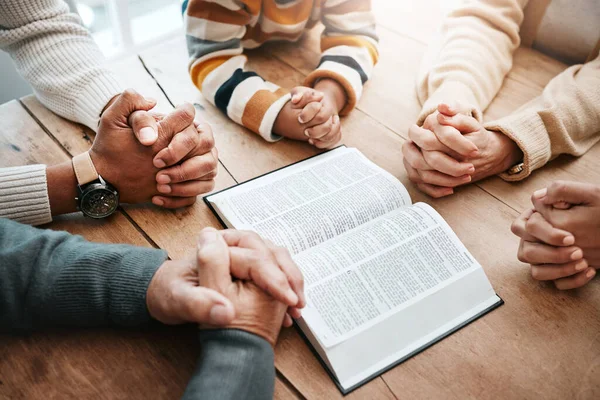 stock image Bible, reading book or hands of big family praying for support or hope in Christian home for worship together. Mother, father or grandparents studying, prayer or asking God in religion with children.