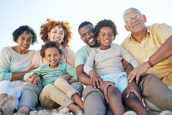 stock image Parents, beach and portrait of children with grandparents enjoy holiday, summer vacation and weekend. Black family, happy and mom, dad and kids excited for quality time, relax and bonding on sand.