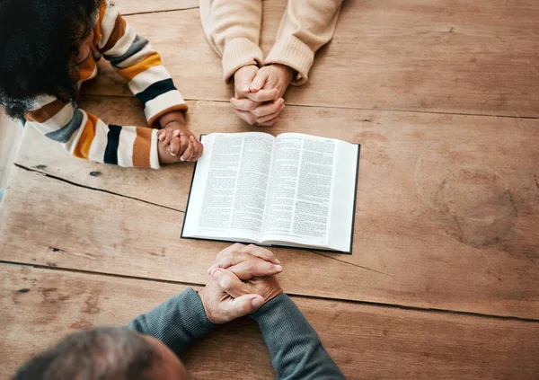Bible, reading book or hands of grandma with children for worship, support or hope in Christianity for education. Kids siblings or grandmother studying, praying or learning God in religion together.