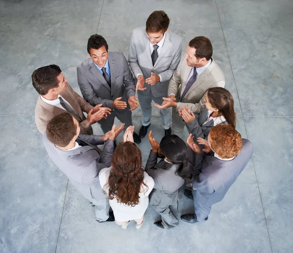 Hes Inspiration Business Team Standing Circle Applauding One Colleagues — Stockfoto