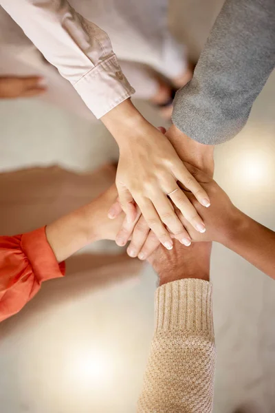 stock image Team building, top view or hands in meeting together on a business or group project for motivation. Diversity, mission or employees in collaboration for our vision, strategy planning or target goals.