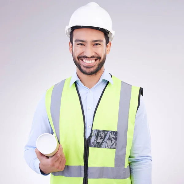Portrait of construction worker man isolated on a white background engineering, architecture and design career. Happy face of asian builder, contractor or industrial person with safety gear in studio.