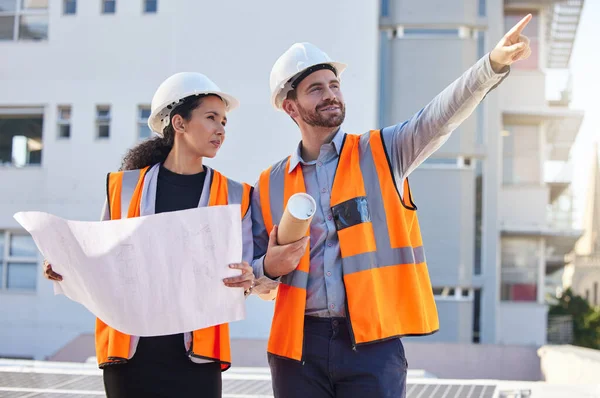 Architecture people pointing outdoor with blueprint planning, teamwork and construction worker at city site. Engineering project, floor plan and woman, contractor or partner for building development.