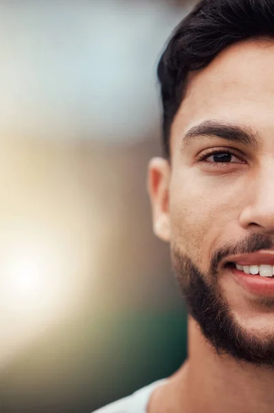 stock image Half face portrait headshot of smiling mixed race tennis player on court with copyspace. Happy fit confident hispanic sports professional standing alone in sports club. Ready for athletic healthy gam.