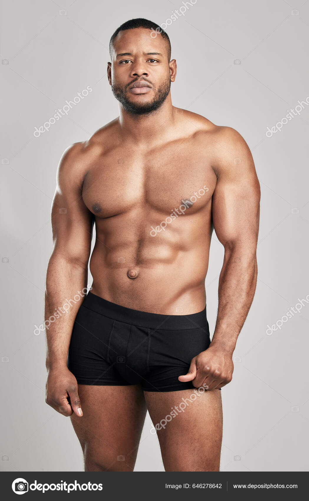 Black man, fitness and body, smile in portrait and abs, healthy and flex  arms, muscle and strong on blue background. Shirtless male in underwear,  exercise and bodybuilder with bare abdomen in studio