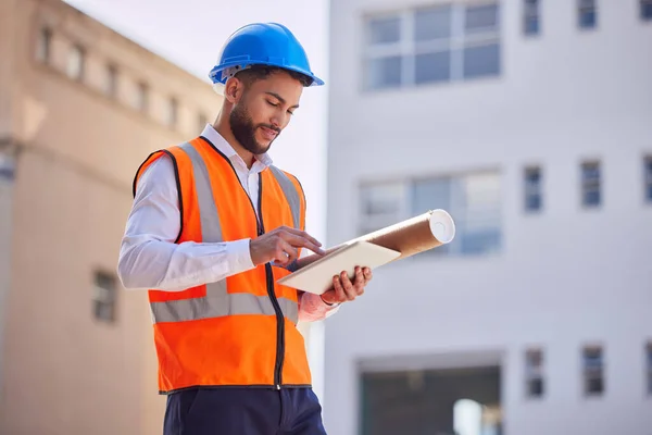 Tablet, outdoor and engineering man, construction worker or building contractor with urban design planning on software. Architecture, city and builder on digital technology with blueprint management.